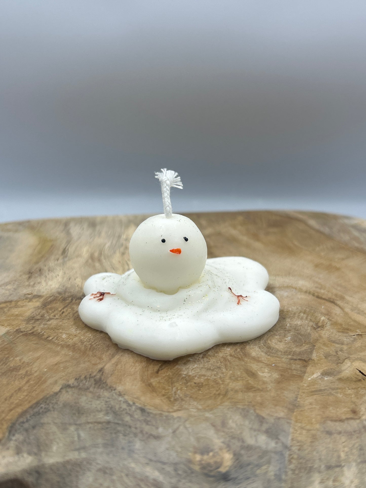 Bougies bonhomme de neige fondu